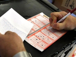 Regular lottery player choose his lotto numbers.